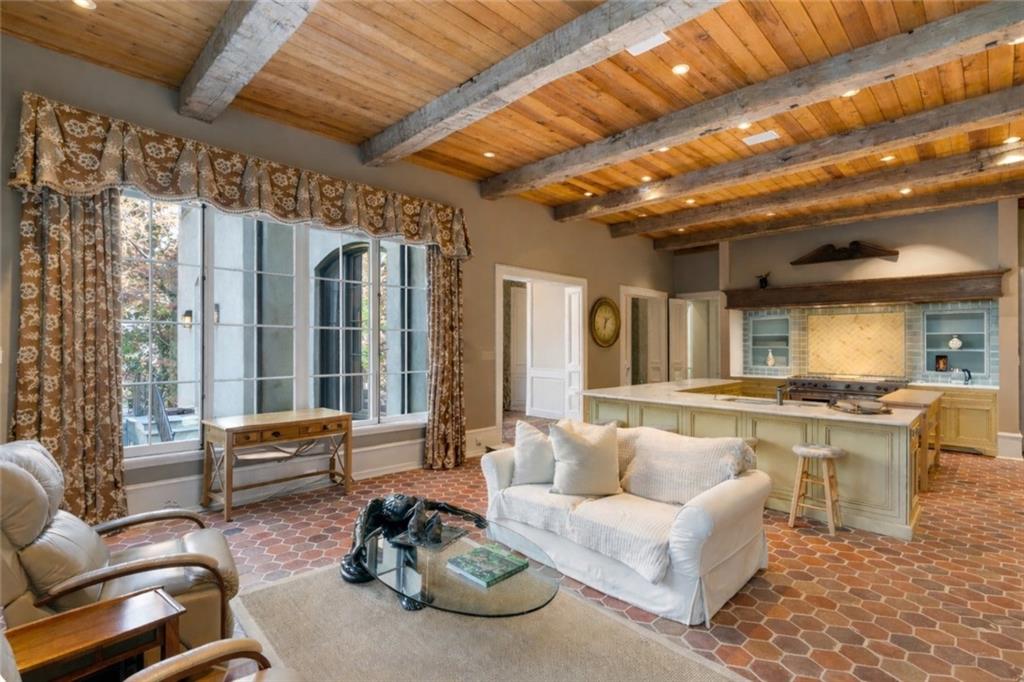 675 West Paces Ferry Road Northwest, Unit 10 Atlanta, GA 30327 - Photo 11 of 47 a living room with furniture and a large window