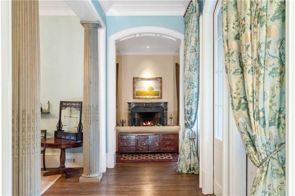 675 West Paces Ferry Road Northwest, Unit 10 Atlanta, GA 30327 - Photo 18 of 47 a view of a hallway and a livingroom with furniture