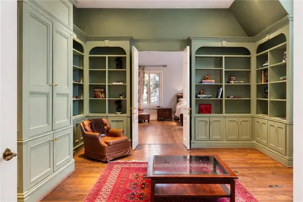 a living room with furniture and a rug