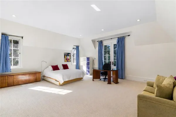 a living room with furniture and a couch