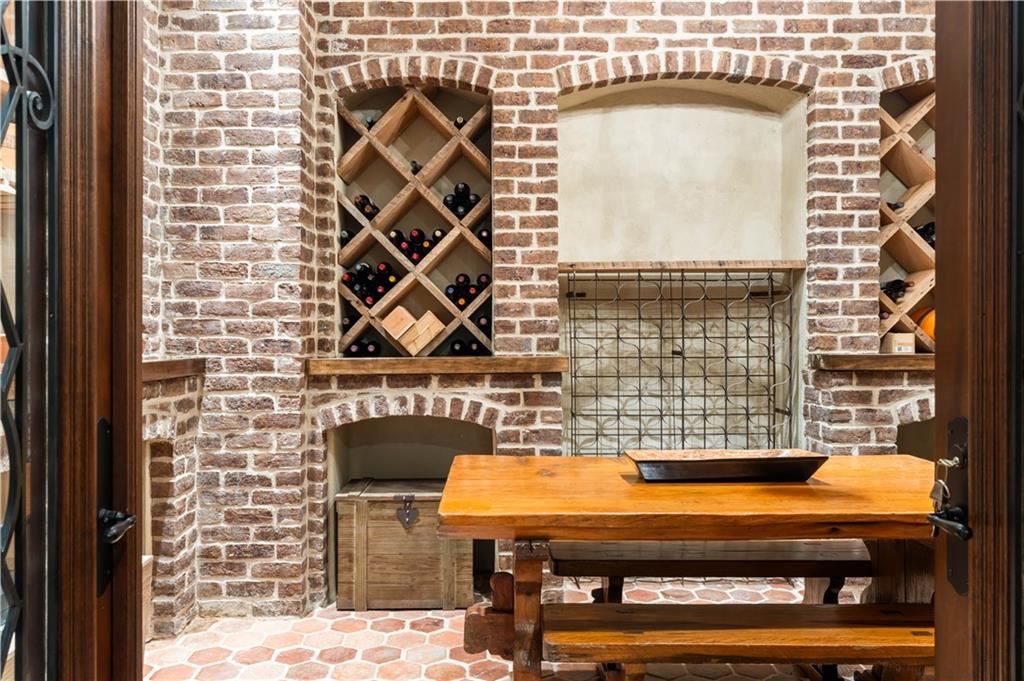 675 West Paces Ferry Road Northwest, Unit 10 Atlanta, GA 30327 - Photo 39 of 47 a view of a balcony with chair and table