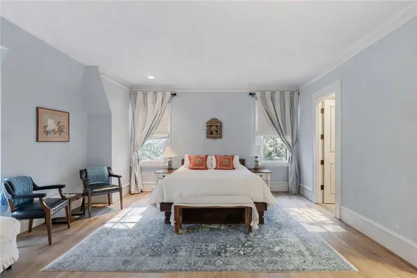 a bed room with a bed and a table