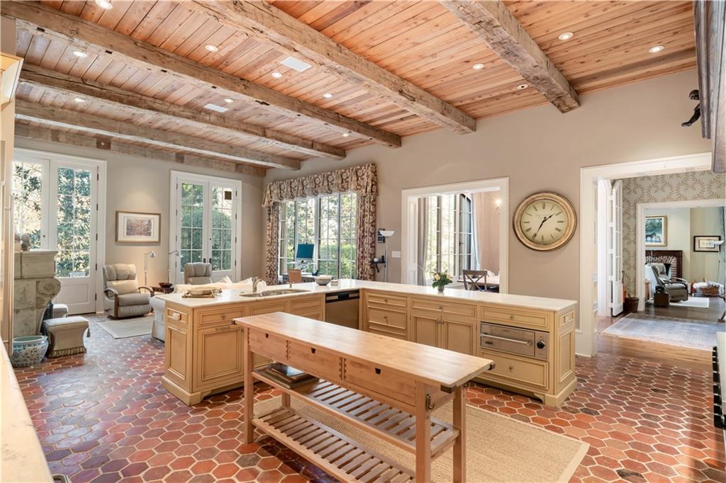 675 West Paces Ferry Road Northwest, Unit 10 Atlanta, GA 30327 - Photo 6 of 47 a large hall with a large window and a large window