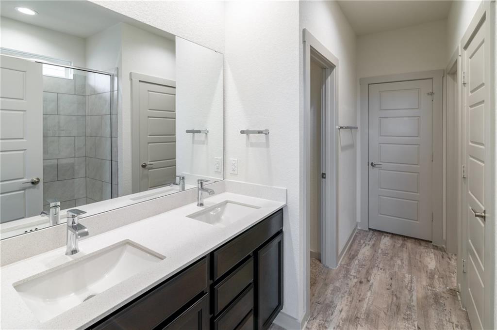 432 Agave Azul Way Leander, TX 78641 - Photo 15 of 36 Dual vanity makes morning routines a little easier.