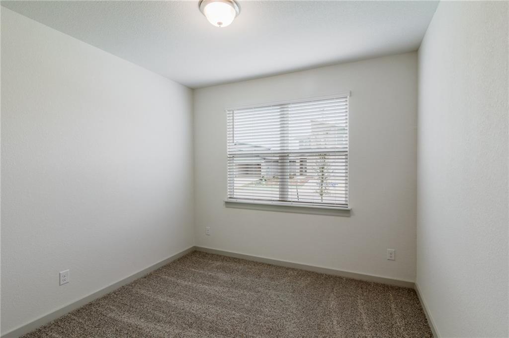 432 Agave Azul Way Leander, TX 78641 - Photo 21 of 36 Bedroom 2 plenty of room for a Queen Sized Bed.