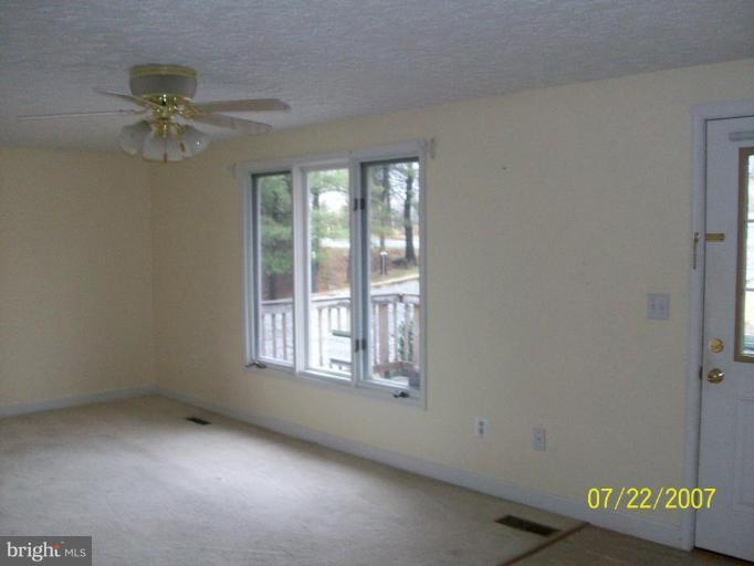 225 Granny Smith Road Linden, VA 22642 - Photo 11 of 13 a view of an empty room with a window