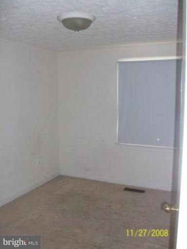 225 Granny Smith Road Linden, VA 22642 - Photo 6 of 13 a view of an empty room