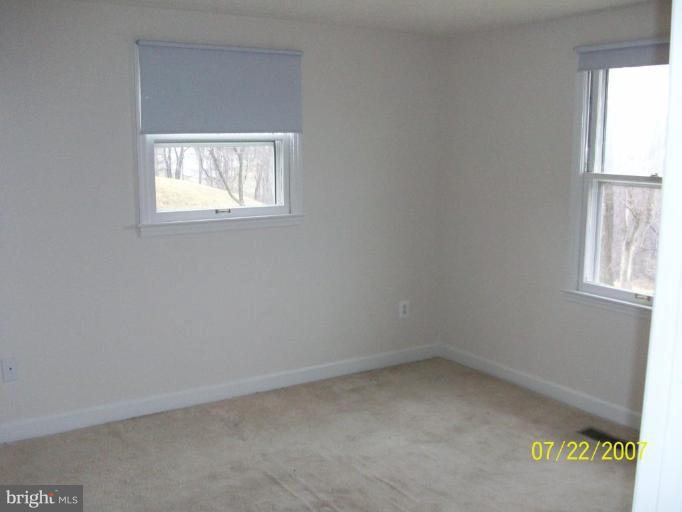 225 Granny Smith Road Linden, VA 22642 - Photo 10 of 13 an empty room with a window