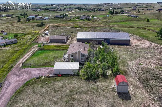 a house view with a backyard space