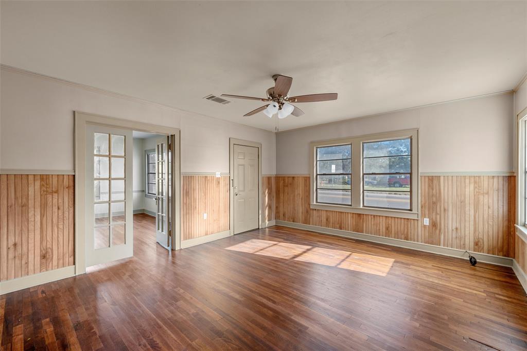 403 South 5th Street Rosebud, TX 76570 - Photo 3 of 13 a view of livingroom with hardwood floor and window