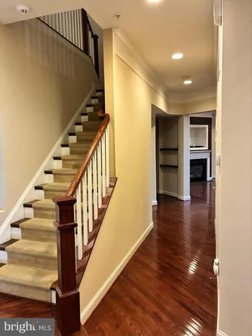 a view of entryway with wooden floor