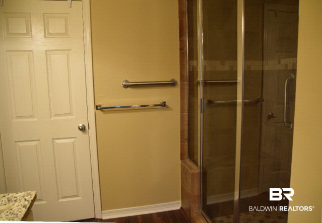 229 Spring Lake Drive Fairhope, AL 36532 - Photo 9 of 21 Complete with a large walk-in tiled shower.