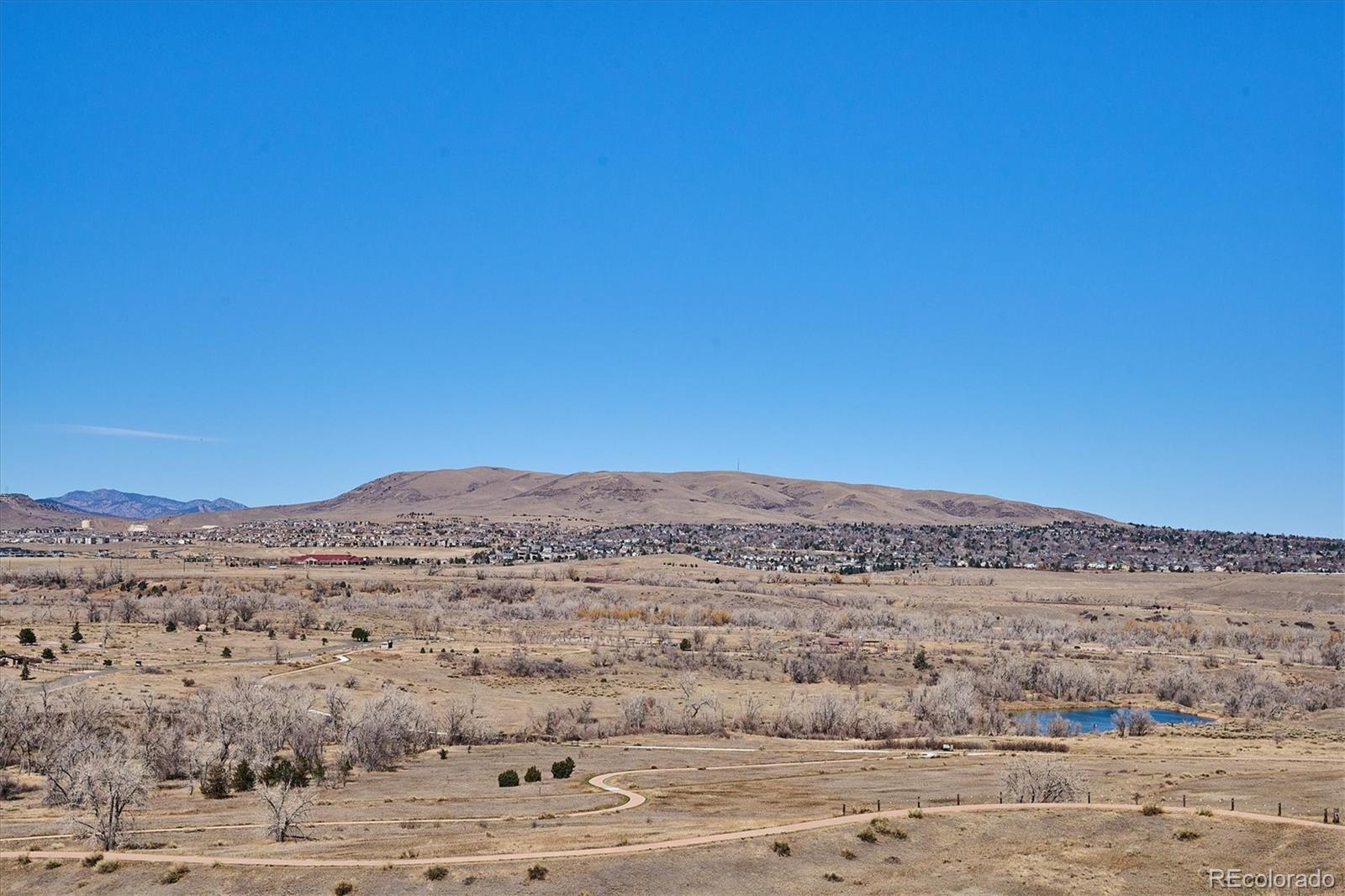 4143 South Deframe Court Morrison, CO 80465 - Photo 8 of 48 a view of city view and mountain view
