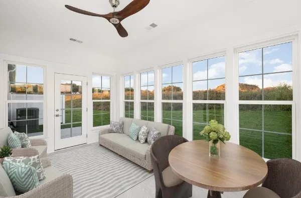 a living room with furniture and a window
