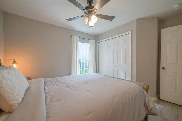 a spacious bathroom with a double vanity sink and a mirror