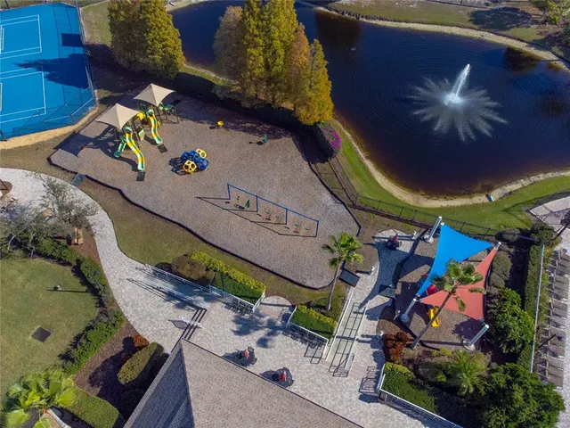 an aerial view of a house with a garden and plants