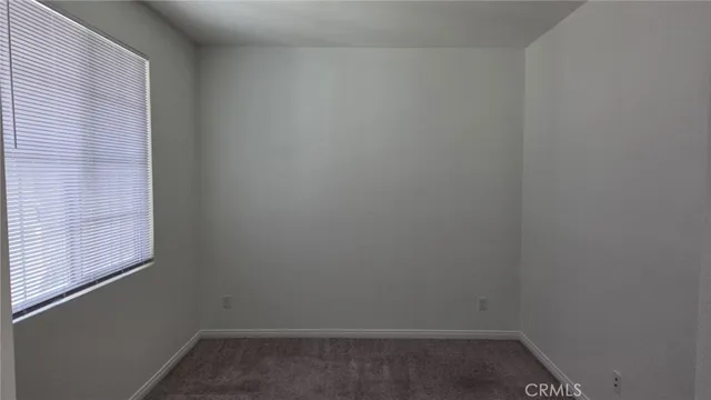 a empty room with a window