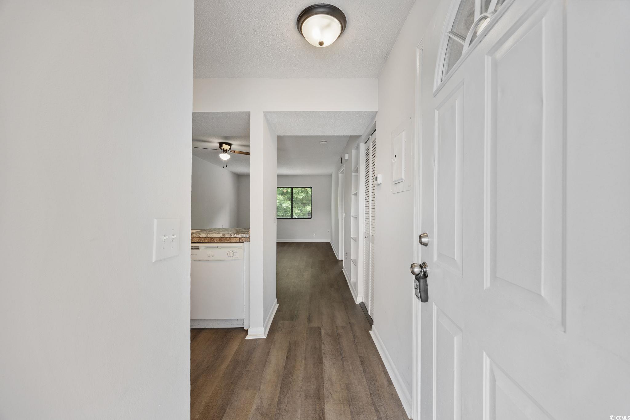 3555 Highway 544, Unit 8H Conway, SC 29526 - Photo 2 of 22 Foyer entrance featuring dark wood finished floors and a ceiling fan