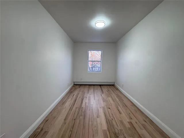 a kitchen with a refrigerator sink stove and cabinets