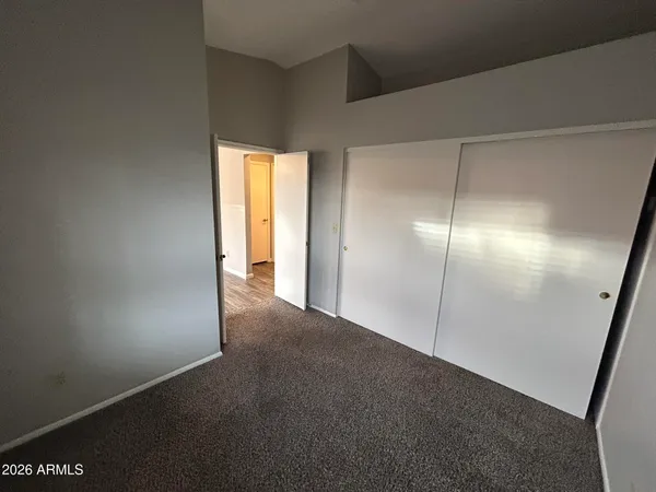 a view of an empty room and window