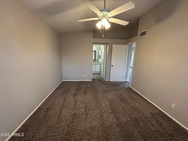 a bathroom with a bathtub and toilet