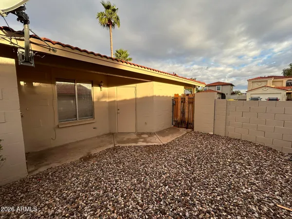 a backyard of a house with lots of green space