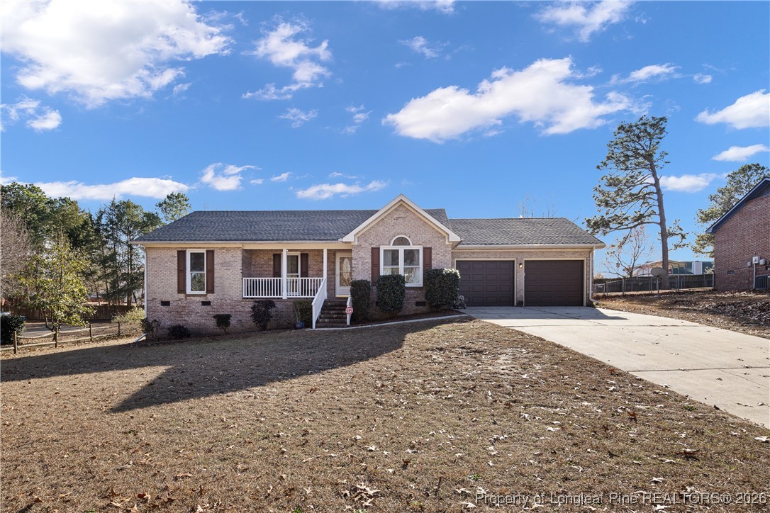 226 Overton Road Raeford, NC 28376 - Photo 1 of 24 a front view of a house with a yard