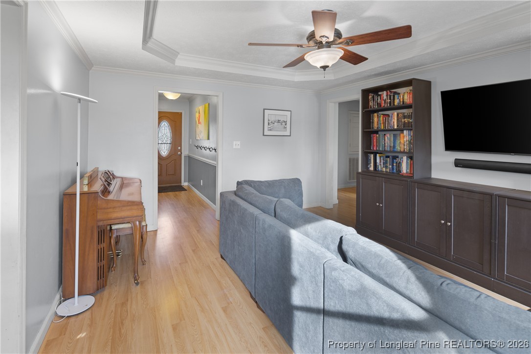226 Overton Road Raeford, NC 28376 - Photo 12 of 24 a living room with furniture and a flat screen tv