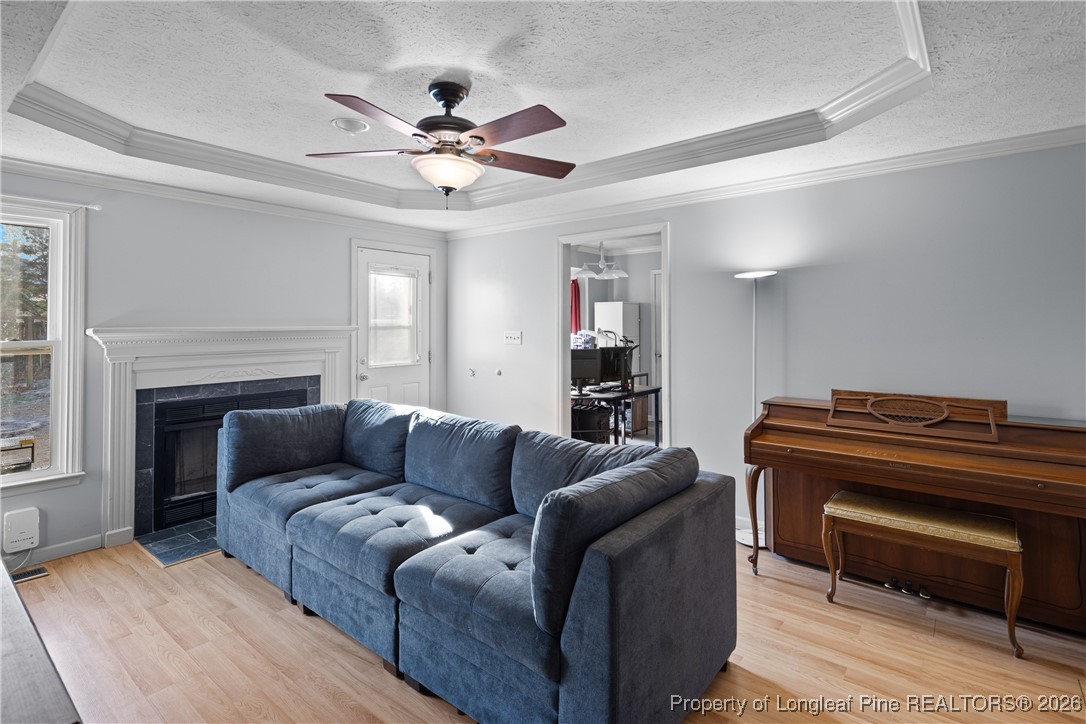 226 Overton Road Raeford, NC 28376 - Photo 13 of 24 a living room with furniture and a fireplace