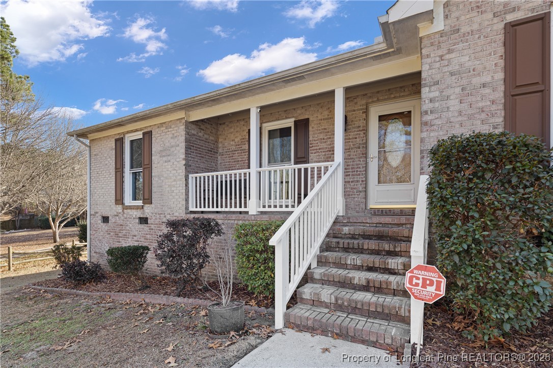 226 Overton Road Raeford, NC 28376 - Photo 2 of 24 a front view of a house with a yard