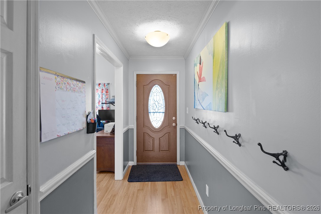 226 Overton Road Raeford, NC 28376 - Photo 3 of 24 a bathroom with a double vanity sink and a mirror