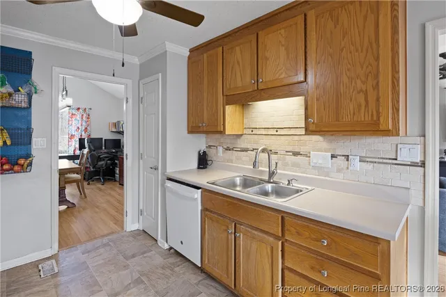 a bathroom with a sink a vanity and a mirror