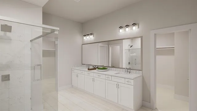 a spacious bedroom with a bed and a couch