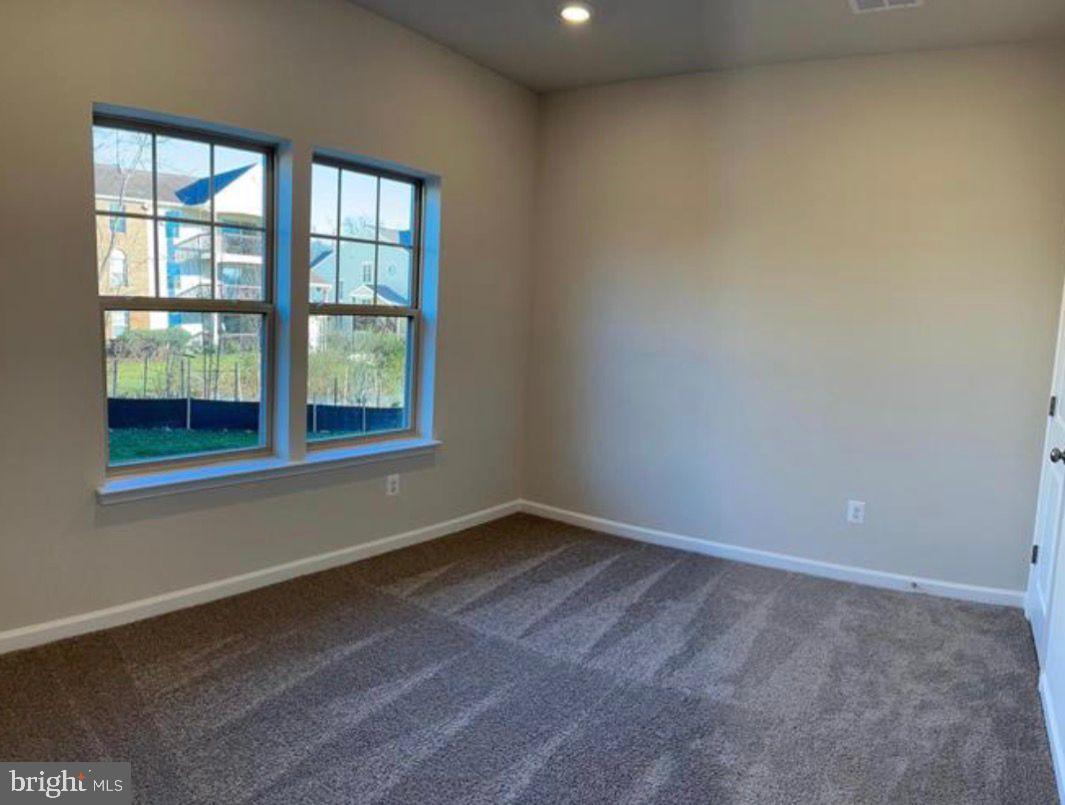 9361 Barnes Loop Manassas, VA 20110 - Photo 11 of 22 an empty room with a window