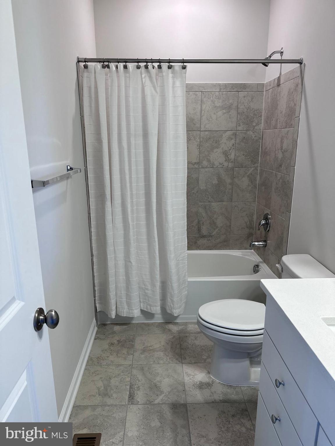9361 Barnes Loop Manassas, VA 20110 - Photo 13 of 22 a bathroom with a sink toilet and shower