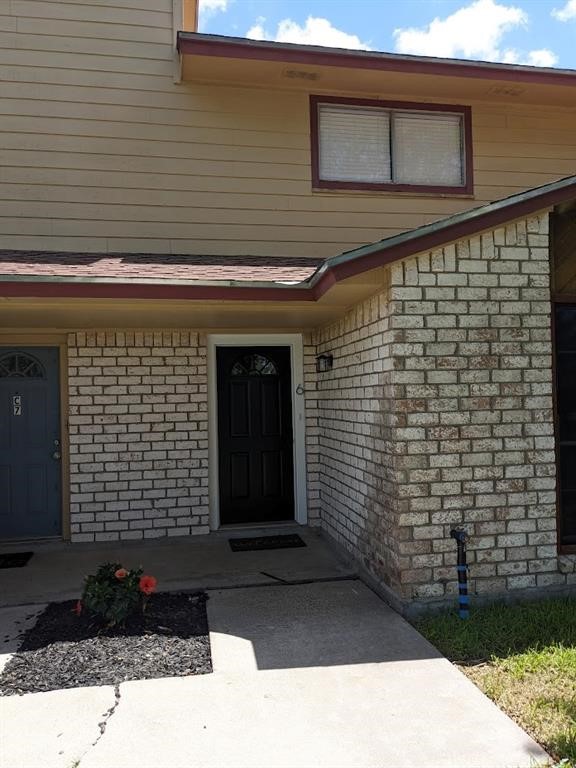 4929 Cedar Pass Drive Corpus Christi, TX 78413 - Photo 2 of 28 a front view of a house with a yard