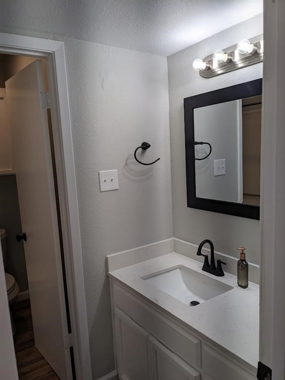 4929 Cedar Pass Drive Corpus Christi, TX 78413 - Photo 7 of 28 a bathroom with a sink vanity and mirror