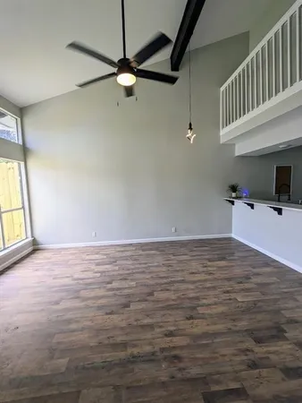 a view of a livingroom with a hardwood floor