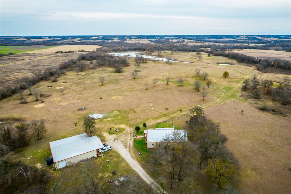 751 Sullivan Road Ennis, TX 75119 - Photo 1 of 38 102 plus acres of peaceful seclusion!