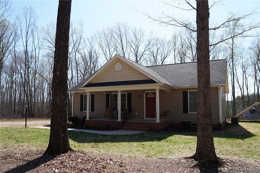 969 Mill Creek Road Meherrin, VA 23954 - Photo 1 of 27 a front view of a house with garden