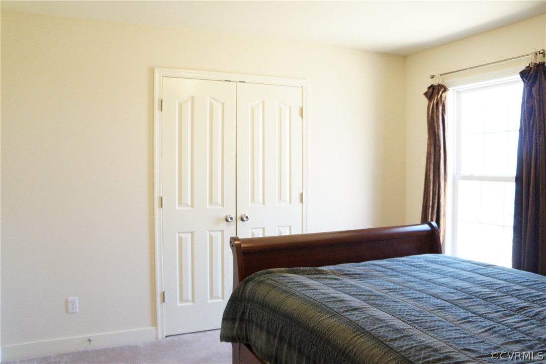 969 Mill Creek Road Meherrin, VA 23954 - Photo 15 of 27 a bedroom with a bed and a window