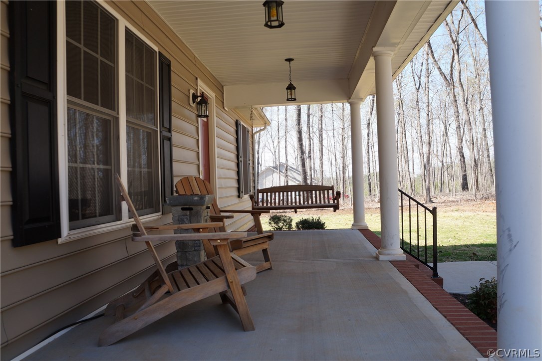 969 Mill Creek Road Meherrin, VA 23954 - Photo 2 of 27 a view of a room with gym equipment and a large window