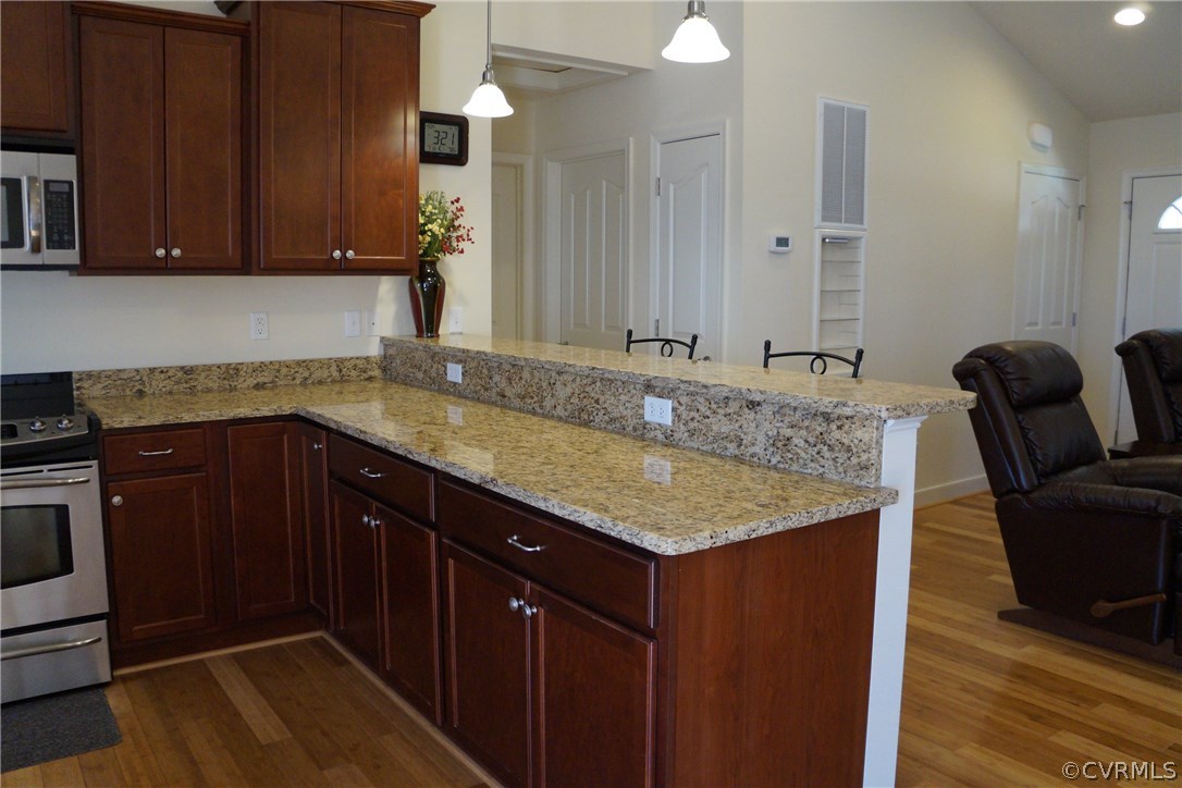969 Mill Creek Road Meherrin, VA 23954 - Photo 7 of 27 a kitchen with granite countertop cabinets table and chairs