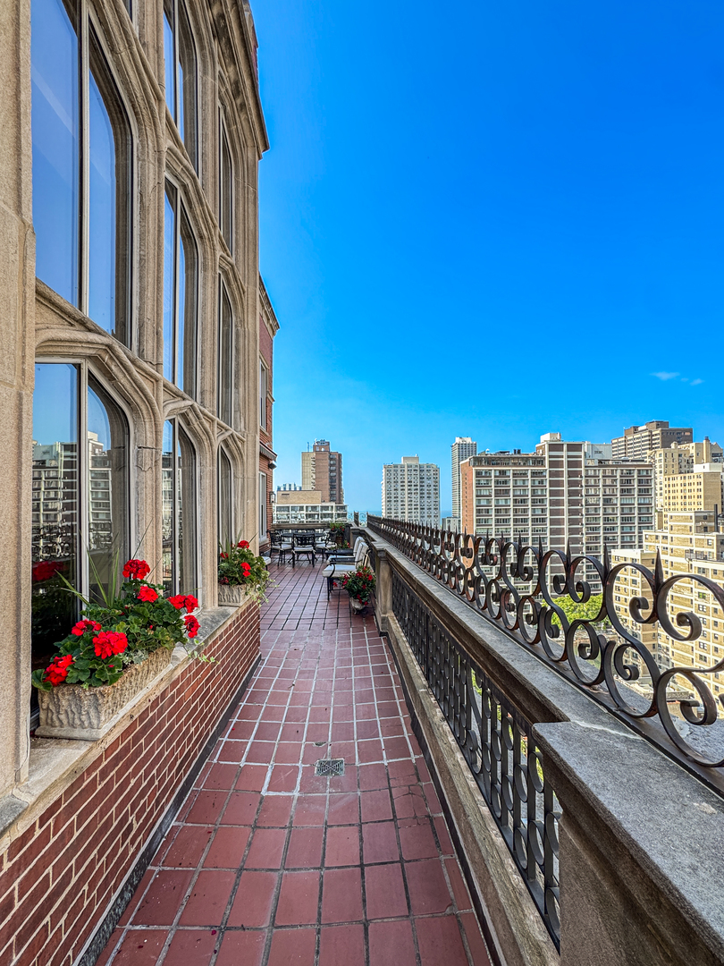 1320 North State Parkway, Unit 1415CD Chicago, IL 60610 - Photo 11 of 51 a view of buildings from the balcony