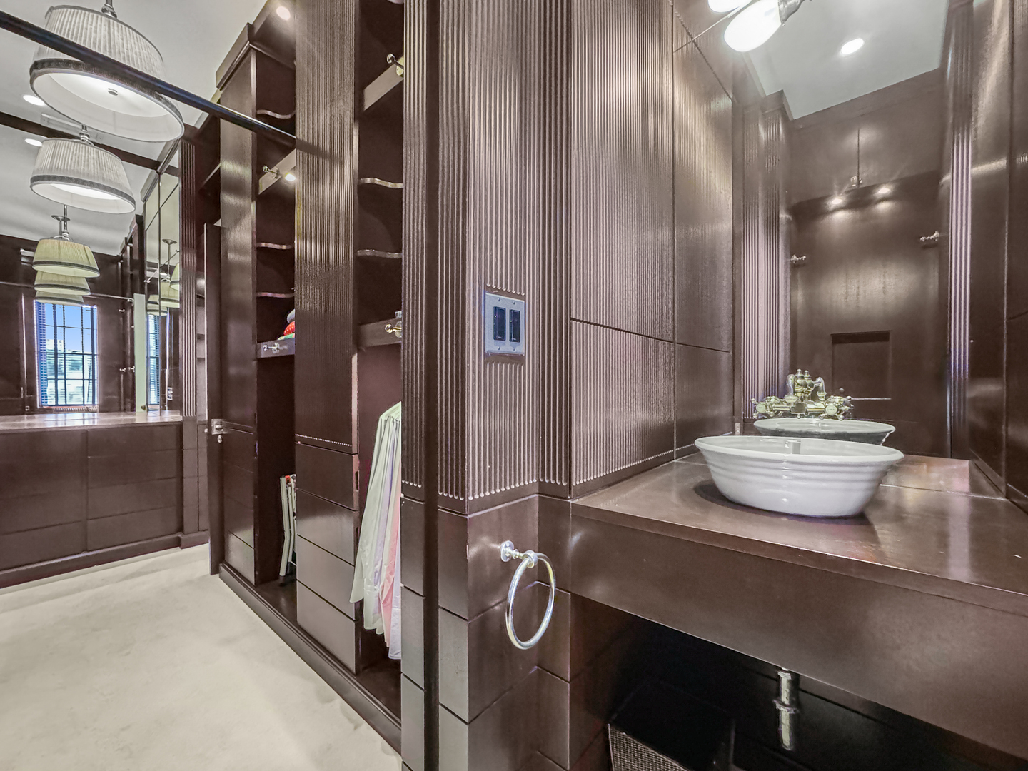 1320 North State Parkway, Unit 1415CD Chicago, IL 60610 - Photo 31 of 51 a bathroom with a sink and mirror