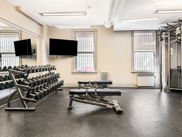 a view of a room with gym equipment