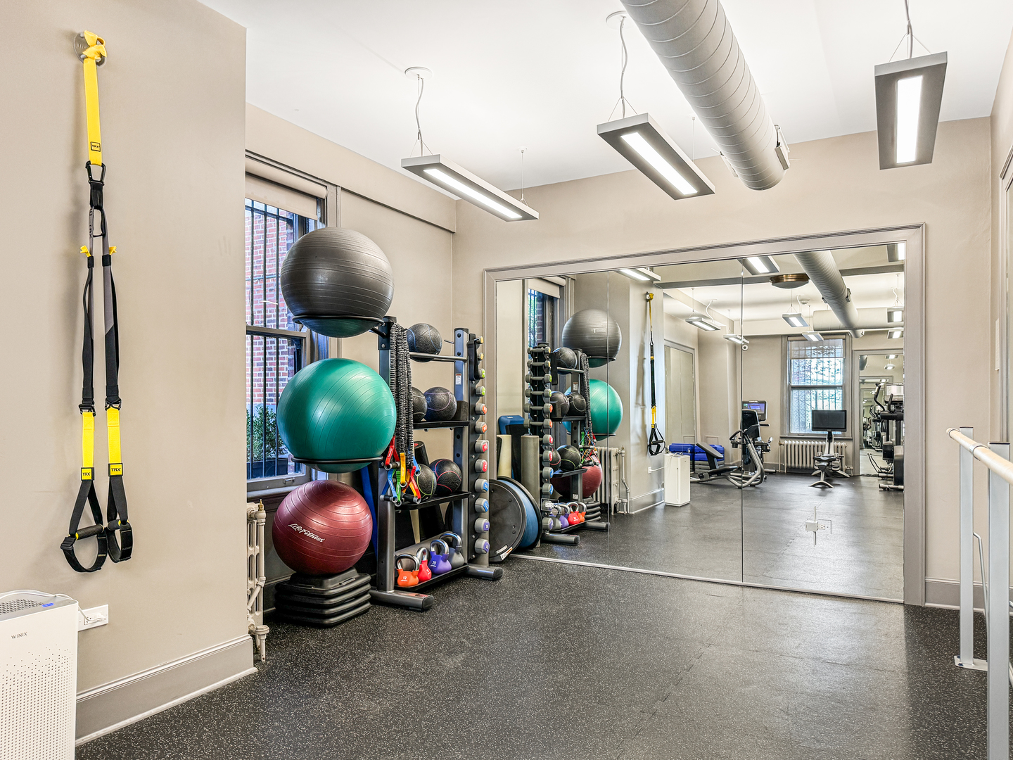 1320 North State Parkway, Unit 1415CD Chicago, IL 60610 - Photo 50 of 51 a view of a room with gym equipment