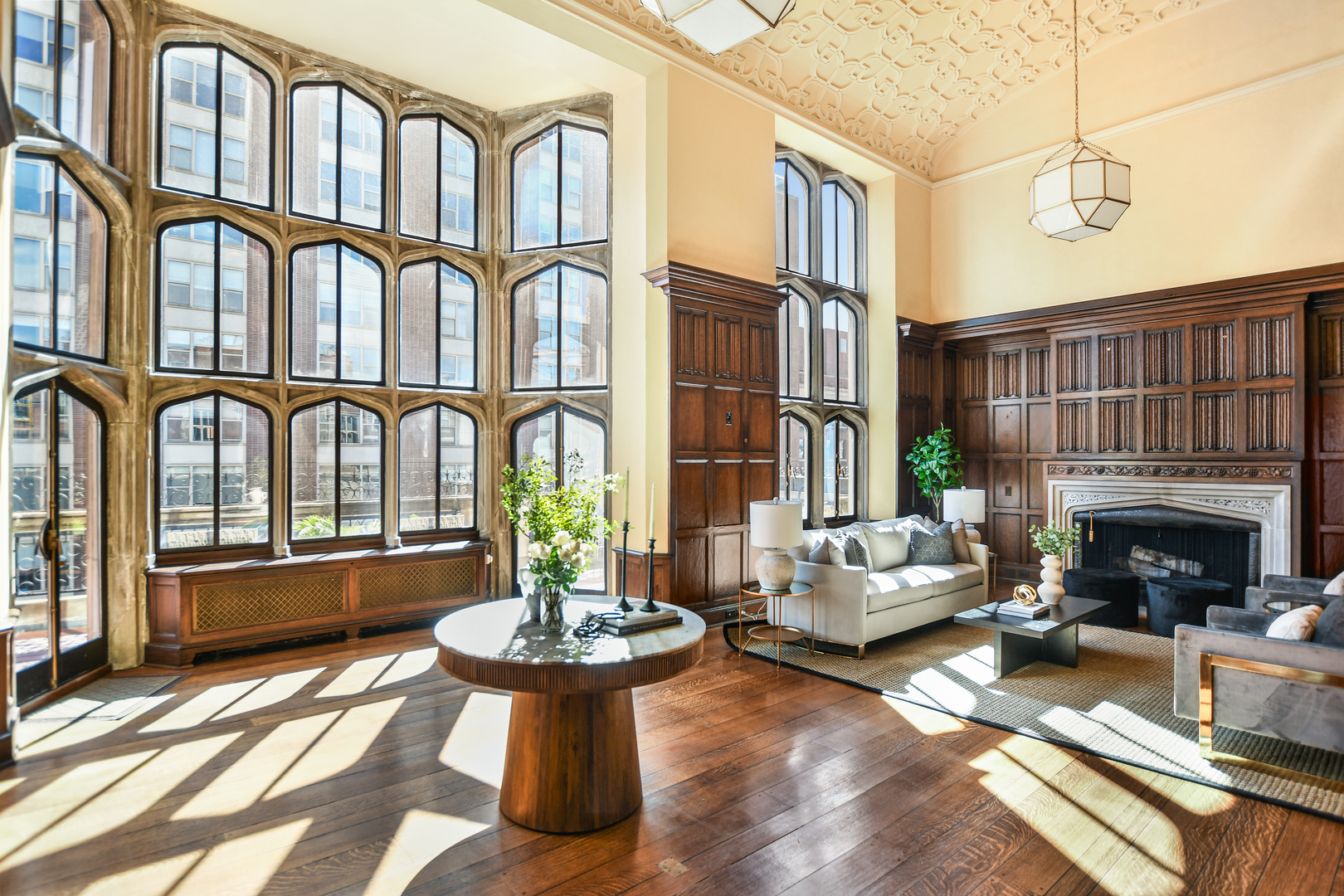 1320 North State Parkway, Unit 1415CD Chicago, IL 60610 - Photo 5 of 51 a view of a patio with couches table and chairs and potted plants