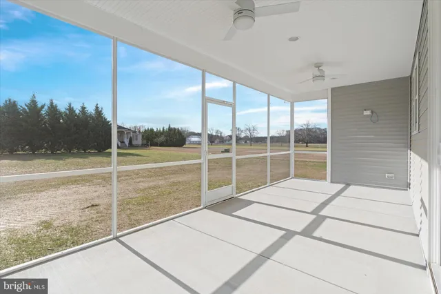 a view of a room with a large window