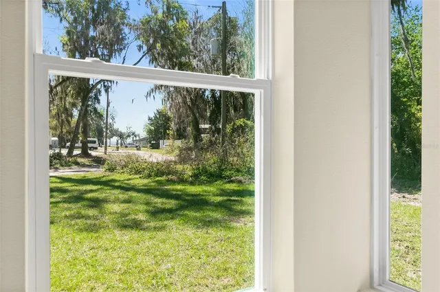 a view of a porch with a yard